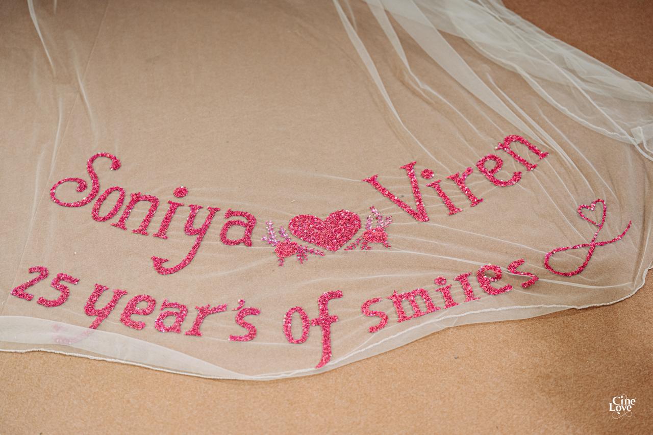 Personalised anniversary embroidery on a sheer ivory veil
